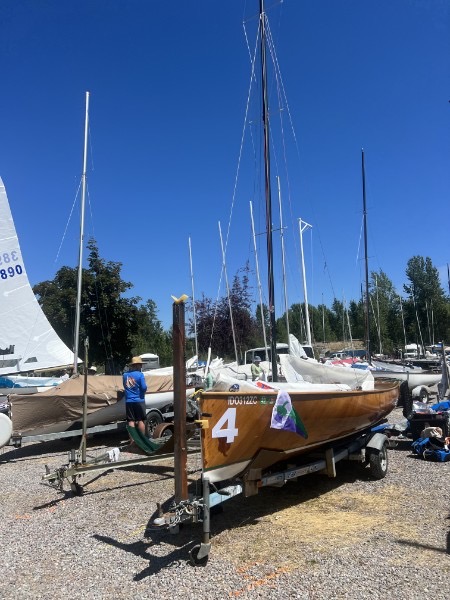 Sugar Sugar on trailer at a regatta, mast up